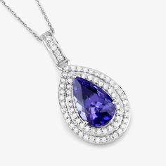 14K White Gold Tanzanite Pendant, Genuine Tanzanite and Diamond Gold Pendant Necklace, Statement Pendant, Bridal Tanzanite Pendant Stunning verdant color beautifies this fundamental symbol of beauty. A glorious halo pendant is adored with genuine pear tanzanite gemstones totaling 2.56 carats. Set in polished 14k white gold with fine finish on a . A truly special piece for yourself or to gift for any festive milestone. , tanzanite pendant halo necklace. 14k gold tanzanite and diamond pendants are Formal Tanzanite Fine Jewelry Necklace, Formal Tanzanite Necklace Fine Jewelry, White Gold Tanzanite Pendant Necklace, Tanzanite Pendant Necklace With Brilliant Cut, White Gold Tanzanite Necklace With Diamond Accents, Tanzanite Jewelry With Accent Stones, White Gold Tanzanite Necklaces With Diamond Accents, Anniversary Tanzanite Necklace With Brilliant Cut, Formal Tanzanite Pear-shaped Jewelry