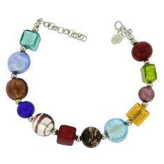 This trendy Murano Glass charms bracelet carefully handcrafted on Murano is a feast for the eyes and a joy to wear. Handcrafted on Murano Island according to the centuries-old glassmaking tradition, this Venetian bracelet artfully combines lots of Murano beads in varying sizes, shapes, and colors created with gold and silver foil inlay, avventurina, and other famous techniques for eclectic and elegant look. This is a truly unique Murano Glass bracelet to bring a sparkle to your jewelry collectio Czech Glass Bracelets With Lobster Clasp As Gift, Nickel-free Glass Bracelets As Gifts, Nickel-free Glass Bracelets For Gifts, Nickel Free Glass Bracelets For Gifts, Multicolor Glass Bracelet Jewelry, Colorful Glass Beads Bracelets Gift, Glass Bracelets For Jewelry Making, Round Glass Bracelets For Jewelry Making, Colorful Glass Bead Bracelets As Gift