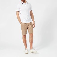 Men's short sleeve polo shirt from Armani Exchange. Crafted from durable cotton, the top features a classic tipped collar, two button placket and short sleeves with coordinating tipped cuffs. Complete with a small A|X logo to the chest. Vented side hems..100% Cotton.Model is 188cm/6'2' and wears a size M. Fitted Polo Shirt With Contrast Collar, Summer Polo Shirt With Contrast Collar And Short Sleeves, Fitted Short Sleeve Polo Shirt With Contrast Collar, Summer Polo Shirt With Contrast Trim, White Cotton Polo Shirt With Contrast Trim, Casual Cotton Polo Shirt With Contrast Trim, Cotton T-shirt With Polo Contrast Collar, Shirt And Short Outfit, Short Outfit Men