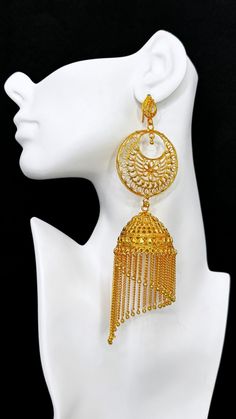 Celebrate the elegance of traditional Indian craftsmanship with these exquisite Golden Jhumka Filigree Earrings. Featuring intricate filigree work and a classic jhumka design, these earrings embody timeless beauty and cultural heritage, perfect for adding a touch of regal charm to any outfit. Bollywood Bridal Earrings With Intricate Design For Ceremonial, 22k Gold Jhumkas For Ceremonial Navratri, Ceremonial 22k Gold Jhumkas For Festive Occasions, Festive 22k Gold Jhumkas For Ceremonial Occasions, Festive Ceremonial 22k Gold Jhumkas, Traditional Filigree Jhumkas For Festive Occasions, Traditional Jhumkas With Intricate Design For Eid, Traditional Filigree Jhumkas For Diwali, Elegant Jhumkas With Intricate Design For Navratri