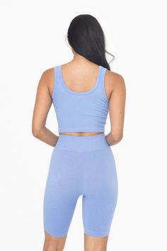 This versatile athleisure top can be layered over your Mono B sports bra during workouts, or paired with casual bottoms and accessories for chic streetwear. It features an all-over ribbed texture and seamless construction. Style: Sporty Print / Pattern: Solid Silhouette: Tank Top Fit: Fitted Embellishment: Seamless Neck Line: V-Neck Sleeve: Sleeveless Length: Cropped Closure: Pullover Lining: No Made In: CHINAFabric Contents: 60% Rayon, 35% Nylon, 5% Spandex Stretch fabric Non-sheer fabric Care Blue Seamless Activewear, Summer Ribbed Tank Top, Ribbed Crop Top For Gym In Spring, Spring Ribbed Crop Top For Gym, Casual Ribbed Cropped Activewear, Casual Cropped Ribbed Sports Bra, Ribbed Cropped Gym Top, Trendy Ribbed Sports Bra For Spring, Athleisure Ribbed Crop Tank Top