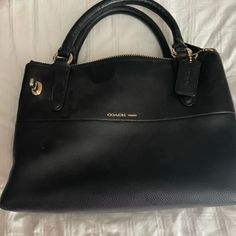 Coach Handbag Used Twice. Black With Three Inner Sections With Plenty Of Room For Essentials. This Is A Beautiful Bag. Coach Satchel With Zipper Closure, Coach Shoulder Satchel With Zipper Closure, Coach Handheld Bag With Zipper Closure, Coach Satchel With Zipper Closure As Shoulder Bag, Black Handheld Satchel With Gold-tone Hardware, Handheld Coach Bags With Zipper Closure, Coach Satchel With Zipper For Everyday Use, Coach Black Shoulder Bag With Top Carry Handle, Coach Double Handle Bag With Zipper