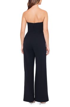 A tuxedo-inspired strapless bodice brings black-tie glamour to this jumpsuit crafted in a wide-leg silhouette and furnished with a pair of handy pockets. Hidden back-zip closure Deep V-neck Strapless Front slant pockets Lined 94% polyester, 6% spandex Spot clean Made in the USA Tuxedo Jumpsuit, Deep V Neck, Black Tie, Bodice, Wide Leg, Size 2, Jumpsuit, Nordstrom, Bring It On