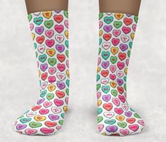 "Conversation Heart Socks, Valentine's Day Socks, Socks for kids, Socks for adults, Fun toddler socks, novelty socks, custom socks, kid socks Our comfortable socks have Polyester/Spandex construction that print great and stretch well. The patented Soft Touch thread provides a soft feel. Please see description of sizes available below. TODDLER ANKLE Toddler shoe size 6-11 Cuff 1.75\" Approx. Length (Including Cuff) 6.5\" Approx. Width 2.5\" TODDLER KNEE HIGH/KIDS CREW Toddler shoe size 6-10 Kid shoe size 11-4 Approx. Length 10\" Approx. Width 3\" KIDS KNEE HIGH/ADULT CREW Kids shoes size 10-3 Ladies shoe size: 4-12 Men shoe size: 6-13 Approx. Length 13.5\" Approx. Width 3.5\" YOUTH/ADULT NO SHOW ANKLET Kids shoe size 2 & Up Ladies shoe size: 4-12 Men shoe size: 6-12 Approx. Length 7.25\" Ap Cute Multicolor Socks For Gifts, Customizable White Socks For Gifts, Customizable White Socks As Gift, Customizable White Socks For Gift, Novelty Multicolor Socks As A Gift, Funny Multicolor Socks For Gift, Funny Multicolor Socks For Gifts, Fun Multicolor Socks For Gifts, Handmade White Socks For Gifts