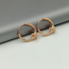 IMPORTANT **Please go through all the pictures i have posted for a listing with a ruler, on a model, on my hand, to get an exact idea of the actual size of the item. ✦Please go through all the pictures on this listing to get a clear idea of the actual size of the piece. Bali style sterling silver ear hoops dipped in real rose gold. Dimensions: 1.2 x 10 mm Price listed is for a pair of ear hoops. These earrings are made of 925 hypoallergenic sterling silver. All my pieces are sent in a gift box. Rose Gold Small Hoop Cartilage Earrings, Adjustable Rose Gold Huggie Earrings, Rose Gold Small Hoop Cartilage Earrings As Gift, Adjustable Small Hoop Earrings In Rose Gold, Rose Gold Hoop Nose Rings As Gift, Rose Gold Hypoallergenic Hoop Cartilage Earrings, Hypoallergenic Rose Gold Hoop Cartilage Earrings, Rose Gold Hoop Cartilage Earrings, Ear Piercings Minimalist