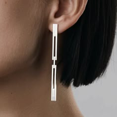 Minimal and elegant with a contemporary twist in design. New member to CONCORD family. This earring is designed to be worn in couple different ways. Made with secure closure on the bottom part it can be bend via hinge and close from the back of the ear. It can also have a more elegant version, when worn open and secured with standard silver earrings nut. You can choose to wear it as one or as a pair, please find more ways to style "aka jewellery" and share it with us! MATERIAL: - Available in si Metal Art Jewelry, Silver Statement Earrings, Metalwork Jewelry, Earrings Aesthetic, Contemporary Earrings, Art Jewelry Contemporary, Minimalist Studs, Classic Earrings, Jewelry Studio