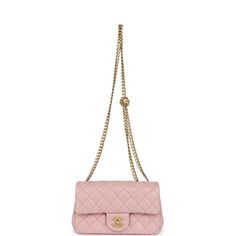 This Camellia Crush Mini Rectangular Flap bag is in Rose Clair lambskin leather with antique gold tone hardware and features a front flap with CC turnlock closure, back half moon pocket and adjustable interwoven antique gold tone chain link shoulder/crossbody strap with camellia flower attachment.The interior is lined in Rose Clair leather and features a small zip pocket with Chanel pull and slip pocket underneath on the rear wall.Collection: 23S (RFID Chip)Origin: ItalyCondition: New and Never wornAccompanied by: Chanel box, Chanel dustbag, ribbon, carebook, Retail UPC Measurements: 8" width x 5" height x 2.5" depth; 22.5" strap drop Luxury Evening Flap Bag With Cc Turnlock Closure, Luxury Crossbody Flap Bag With Cc Turnlock Closure, Luxury Double Flap Bag With Cc Turnlock Closure, Elegant Double Flap Bag With Gold-tone Hardware, Elegant Double Flap Soft Leather Bag, Luxury Flap Shoulder Bag, Luxury Flap Bag With Cc Turnlock Closure For Travel, Pink Leather Bag With Cc Turnlock Closure, Pink Evening Shoulder Bag With Cc Turnlock