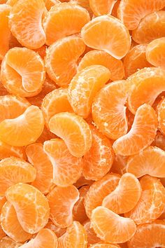 an image of sliced oranges that are very close to the cameraman's eye