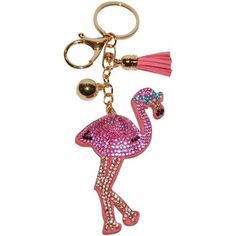 a pink flamingo keychain with a tassel on it's side