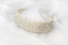 Introducing our exquisite Pearl Headband. A fabulous statement piece that will be the perfect finishing touch to your outfit.   Perfect for a bride on her wedding day or hen do, a wedding guest accessory or a day at the races, it can be used for many special occasions so a great investment piece.  Crafted from a beautiful matt hessian fabric with utmost care and attention to detail and it's a soft and comfortable fit ensures a secure yet gentle hold throughout the day. Wedding Guest Hair Accessories, Bridal Pearl Headband, Wedding Guest Hair, Headband For Wedding, Wedding Guest Accessories, Hessian Fabric, Pearl Bridal Headband, Guest Hair, Day At The Races