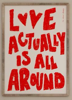 a red and white poster with the words love actually is all around on it's side