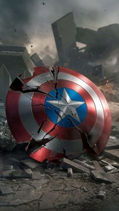 the captain's shield has been smashed into pieces and is sitting on the ground