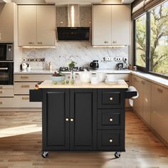 a kitchen with an island in the middle and lots of cupboards on both sides