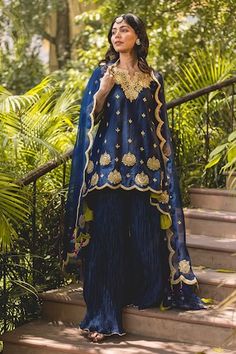 Navy blue banarasi chanderi kurta with marori and lace patchwork embroidery. Paired with scallop edge embroidered dupatta and crushed sharara. - Aza Fashions Blue Dola Silk Palazzo Set With Straight Kurta, Designer Blue Dola Silk Palazzo Set, Blue Art Silk Palazzo Set For Wedding, Royal Blue Sharara With Zari Work, Blue Palazzo Set With Dupatta For Wedding, Blue Raw Silk Dupatta With Gota Work, Eid Blue Dola Silk Palazzo Set, Royal Blue Anarkali Set With Cutdana, Royal Blue Designer Sharara