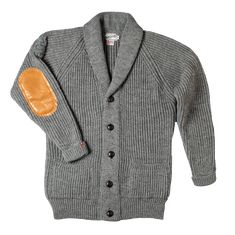 A versatile chunky knit, this Classic, shawl neck cardigan gives a relaxed look to your style, with a new twist… we’ve added Italian Tan Calfskin leather elbow patches with double stitching. The Cardigan features a ribbed collar, cuff, and hem, as well as the classic 5 leather buttons on the front. This is comfort, warmth, and style in one garment. Designed and made in Britain - Produced for &SONS by a family business that blend traditional talents with 21st-century wool for versatile heritage. Leather Elbow Patches, Selvedge Denim Jeans, Work Wear Outfits, Denim Workwear, Vintage Inspired Outfits, Collar Cardigan, Mens Lifestyle, Selvedge Denim, Elbow Patches