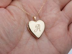 A large 14K GOLD FILLED heart photo locket,custom engraved gold Locket,remembrance locket,Memory locket,mother anniversary gift,birthday gift,keepsake gift Keeping your loved ones and memorable moments close to your heart, this custom engraved gold filled photo locket necklace has: 1. One shining, highly polished 14K GOLD FILLED heart locket (measuring 20.5 x 19.5 mm). You can have it blank, engraved on one side or both sides with initials, important dates, greeting words, bible verses, or simpl Dainty Rose Gold Locket Necklace For Anniversary, Wedding Jewelry Medallion With Heart Charm, Anniversary Rose Gold Heart Charm Locket Necklace, Rose Gold Heart Charm Locket Necklace For Anniversary, Rose Gold Locket For Anniversary Gift, Dainty Pendant Locket Necklace For Anniversary, Rose Gold Locket Jewelry For Anniversary Gift, Rose Gold Locket Necklace With Heart Charm For Weddings, Rose Gold Locket Jewelry For Anniversary