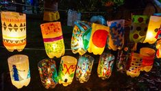 many lanterns are lit up in the dark