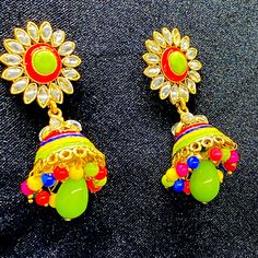 Beautiful Hand Painted Earrings Very Elegant And Beautiful Green Danglers For Party And Festivals, Green Drop Earrings For Festivals, Green Drop Earrings Danglers For Festivals, Traditional Green Earrings For Party, Multicolor Drop Earrings For Party, Green Earrings With Latkans For Party, Green Latkan Earrings For Party, Bohemian Green Earrings For Celebration, Green Festive Earrings For Festivals