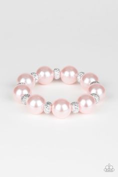 A refined collection of oversized pink pearls and glittery metallic encrusted silver beads are threaded along a stretchy band around the wrist for a glamorous touch. Featured inside The Preview at ONE Life! Sold as one individual bracelet. P9RE-PKXX-193XX Pink Pearl Bracelet, Pink Pearls, Silver Pearl Necklace, Toggle Bracelet, Elegant Bracelet, Stretchy Bracelets, Paparazzi Jewelry, One Life, Pink Bracelet