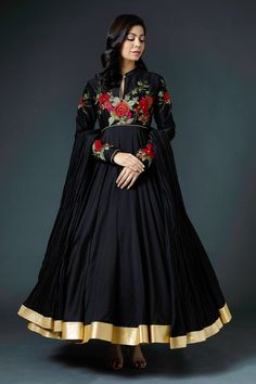 Black anarkali with placement floral embroidery and gold border. Comes with crinkled dupatta and churidar.
Component: 3
Pattern: Embroidery
Type Of Work: Thread
Neckline: Band
Sleeve Type: Full
Fabric: Chanderi Silk; Lining: Cotton
Color: Black
Other Details: 
Keyhole cutout front
Closure: Loop button front
Note: Kindly contact customer care to add can-can / padding at additional charges.
Occasion: Wedding - Aza Fashions Black Anarkali, Silk Anarkali, Rohit Bal, Luxury Sale, Gold Border, Pattern Embroidery, Black Thread, Cotton Embroidery, Churidar