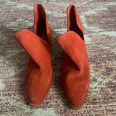 Never Worn. Burnt Orange Suede Ankle Booties With Slight Heel. Size 37 Eu/6.5 Us. Some Weathering In The Suede In The Front Of The Boot As Pictured. Slip-on Suede Booties Medium Width, Spring Suede Slip-on Booties, Slip-on Booties With Stacked Heel, Medium Width, Slip-on Booties With Stacked Heel, Slip-on Booties With Stacked Heel And Medium Width, Spring Suede Booties With Almond Toe, Free People Shoes, Burnt Orange, Ankle Booties