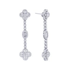 Designed with sophistication and beauty in mind, the Trefoil Diamond Drop Earrings feature a classic clover design crafted with 18 karat gold and 2 5/8 carats of round brilliant and baguette diamonds for an exquisite finish. A timeless accessory for any look. Clover Design, Baguette Diamonds, Diamond Drops, Diamond Drop Earrings, Timeless Accessories, Jewelry Inspo, Baguette Diamond, Round Brilliant, Design Crafts