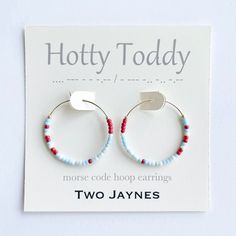 "Perfect for Ole Miss fans and grad gifts. ----------------------------------------- ITEM DETAILS: This listing is for 1 pair of morse code hoop earrings.   - choice of message in RED & baby BLUE           message \"Ole Miss\" -> morse code \"--- .-.. . / -- .. ... ...\" (24 beads)           message \"Hot Toddy\" -> morse code \".... --- - - -.-- / - --- -.. -.. -.--\" (36 beads) - choice of 14k gold filled or sterling silver wire - Earrings are 30mm - Arrives boxed with a TJ morse code card, pr Blue Dainty Hypoallergenic Hoop Earrings, Dainty Blue Hypoallergenic Hoop Earrings, Hypoallergenic Hoop Jewelry For Birthday, Hypoallergenic Hoop Jewelry For Birthdays, Handmade Blue Huggie Hoop Earrings, Handmade Blue Hoop Earrings In 14k Gold Filled, Blue Nickel-free 14k Gold-filled Hoop Earrings, Handmade Blue 14k Gold Filled Hoop Earrings, Code Alphabet