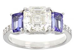 Moissanite Fire(R) 3.08ctw diamond equivalent weight asscher cut and round with .85ctw octagonal cut tanzanite, Platineve(R) ring. Measures approximately 5/16" L x 1/16" W and is not sizeable. Actual moissanite weight is 2.37ctw. Comes with certificate of authenticity. Brilliant Cut Octagon Sapphire Ring In Platinum, Octagon Brilliant Cut Sapphire Ring With Diamond, Luxury Asscher Cut Sapphire Ring, Platinum Diamond Ring With Asscher Cut Gemstone, Asscher Cut Diamond Ring In Platinum, Asscher Cut Diamond Platinum Ring, Brilliant Cut Asscher Sapphire Ring In Fine Jewelry, Gia Certified Asscher Cut Sapphire Ring, Formal Tanzanite Ring With Asscher Cut