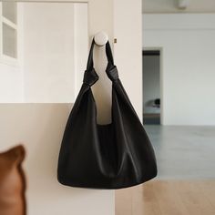 Discover Elegance and Comfort Step into the world of luxury and style with our Korean Oversized Soft Genuine Leather Hobo Shoulder Bag. Designed exclusively for the fashion-forward woman, this bag blends timeless elegance with a modern twist. The ultra-soft cowhide leather ensures a sumptuous feel, while the versatile patchwork design adds a unique touch to your everyday ensemble. Exceptional Craftsmanship Crafted from premium genuine leather, this shoulder bag promises not only style but also d Elegant Black Hobo Shoulder Bag, Elegant Rectangular Hobo Bag In Soft Leather, Chic Large Capacity Hobo Bag For Travel, Chic Office Hobo Bag With Large Capacity, Elegant Hobo Bucket Bag For Everyday, Elegant Hobo Bag With Leather Handles For Office, Luxury Hobo Bag For Everyday, Chic Hobo Shoulder Bag For Shopping, Elegant Large Capacity Hobo Bag For Evening