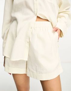 Pretty Lavish boxy shorts with pockets in cream - part of a set | ASOS White Short Sets For Daywear, Casual Short Sets With Pockets, Short Cotton Sets With Pockets, Cotton Sets With Pockets And Short Length, Daywear Pajama Shorts With Pockets, Beige Loungewear Sets With Pockets, Summer Short Sets With Pockets, Summer Sets With Pockets And Short Length, Beige Relaxed Fit Summer Sets