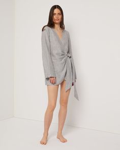 Designed in a mini crossover silhouette, this Air Linen Wrap Dress is cut from a breezy linen blend, with wide sleeves and a functional side tie. Chic Mini Wrap Dress With Tie Waist, Daywear Mini Dress With Tie Fastening, Chic V-neck Mini Dress For Loungewear, Chic Wrap Mini Dress For Brunch, Daywear Linen V-neck Mini Dress, Spring Daywear Wrap Dress, Linen V-neck Mini Dress For Daywear, Long Sleeve Linen Mini Dress For Beach, Fall Daywear Wrap Dress