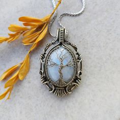 Moonstone tree of life Cooper wire wrapped pendant. Handmade jewelry. With steel stainless chain Spiritual White Jewelry For Gifts, Spiritual White Jewelry As A Gift, White Spiritual Jewelry For Gifts, White Engraved Necklace For Gift, Handmade White Jewelry For Gifts, Handmade White Jewelry Gift, Handmade White Jewelry Perfect For Gifts, White Engraved Jewelry As A Gift, White Engraved Jewelry As Gift