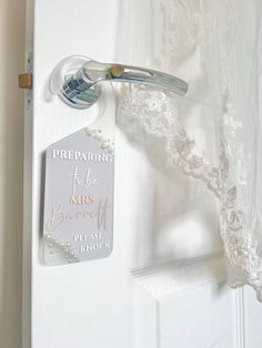 there is a door handle on the side of a white door that says preparing to be married