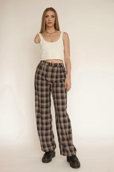 High rise trouser Wide leg Black/Tan Plaid Zipper/Button closure with pockets Model is 5'9" and wearing a size Medium. Plaid Trousers Outfit, Plaid Pants Outfit, Checkered Trousers, Tartan Pants, Work Fits, Trouser Outfit, Plaid Trousers, Style Goals, Scottish Plaid