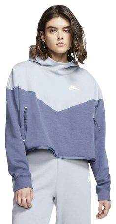 Nike Sportswear Tech Fleece Women Pullover Hoodie Blue CJ3871 464 100% Authentic, Brand New with tag Women Size: Medium Style # CJ3871 464 Product Details:   Nike Tech Fleece features a layer of insulating cotton sandwiched between knit fabric for extra warmth without extra weight or bulk. High-contrast blocks of color on select colorways give you bold, eye-catching style. Classic chevron design lines are the inspired by the classic Windrunner jacket. Scuba hood provides extra coverage and ribbe Functional Sports Sweatshirt, Sporty Sweatshirt With Adjustable Hood And Funnel Neck, Functional Fleece Hooded Top, Functional Hooded Fleece Top, Sportswear Fleece Hooded Top, Blue Sportswear Sweats For Fall, Hooded Fleece Top For Sportswear, Hooded Fleece Sportswear Top, Blue Hooded Moisture-wicking Sweatshirt