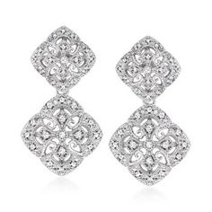 Ross-Simons - .25 ct. t.w. Diamond Filigree Drop Earrings in Sterling Silver. With a lacy vintage-inspired design, these gorgeous drop earrings boast fanciful filigree patterns bright with .25 ct. t.w. diamond rounds in polished sterling silver. Hanging length is 7/8". Post/clutch, diamond drop earrings. Diamond birthstones are the perfect gift for April birthdays. Classic Chandelier Earrings With Diamond Accents For Evening, Wedding Diamond Filigree Earrings, Wedding Filigree Diamond Earrings, Wedding Diamond Earrings With Filigree, Wedding Diamond Earrings With Filigree Detail, Formal Filigree Diamond Drop Earrings, Formal Filigree Drop Diamond Earrings, Classic Formal Chandelier Earrings With Intricate Design, Elegant Diamond Dangle Earrings With Intricate Design