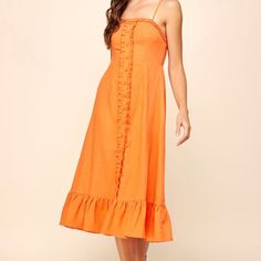 Sleeveless Ruffle Linen Midi Dress In Orange Strapless Sundress With Ruffles, Brunch Midi Sundress With Ruffle Hem, Strapless Ruffled Sundress For Spring, Ruffled Midi Sundress For Brunch, Strapless Flirty Sundress With Ruffles, Flirty Strapless Sundress With Ruffles, Midi Sundress With Ruffles For Brunch, Strapless Ruffle Sundress For Brunch, Spring Sleeveless Ruffle Dress For Casual Wear