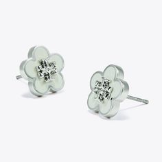 In bloom. The Kira Enamel Flower Stud Earring is made of colorful enamel set on 18K-gold-plated brass or silver-tone plating. Pair with the matching necklace and bracelet for a matching set. Made for pierced ears. Elegant Enamel Flower Shaped Jewelry, White Metal Flower Shaped Jewelry, White Metal Flower-shaped Jewelry, Elegant Enamel Flower Earrings, Elegant Hypoallergenic Enamel Earrings, White Metal Jewelry With Flower Charm, Enamel Flower Charm Earrings, Enamel Flower Earrings With Flower Charm, Elegant Flower Shaped Enamel Earrings