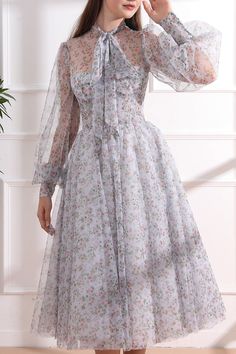 Feminine Long Sleeve Organza Dress, Feminine Long Sleeve Tulle Dress, Lavender Long Sleeve Formal Dress, Long Sleeve Floral Print Organza Dress, Long Sleeve Lavender Formal Dress, Elegant Lavender Long Sleeve Dress, Lavender Long Sleeve Dress For Garden Party, Elegant Long Sleeve Lavender Dress, Purple Sheer Long Sleeve Dress