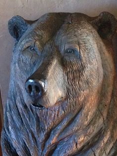 a statue of a bear with its eyes closed