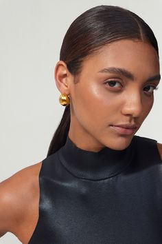 These gold chunky hoop earrings add a touch of chic to any look. Perfectly minimalistic, waterproof, and tarnish-free, these beauties make a great go-to statement earrings. Made of hollow + lightweight metal and dipped in thick gold plating, these earrings are perfect for everyday wear! ……………��…………………….D E T A I L S• Materials: Stainless steel, 18k gold plating• Hoop Diameter: 2.3cm (0.8 inches) • Hoop Width: 1.8cm (0.7 inch)• This product is hypoallergenic, waterproof and tarnish resistant Contemporary Fine Jewelry, Chunky Hoop Earrings, Modern Muse, Minimal Jewelry, Jewelry Branding, Gold Plating, Jewelry Care, Statement Earrings, Gold Earrings