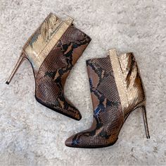 Stunning Texas Paris Leather Booties In A Size 38.5 Or 8. These Have A Cowgirl Pull-Tab Style With Stiletto Heel And Pointed Toe. Snakeskin Body Split With Gold Covered Heel. Professionally Soled For Added Durability. Super Unique And Fun! Never Worn, Perfect Condition. Gold Leather Chic Heeled Boots, Luxury Heeled Boots With 4-inch Heel For Fall, Luxury Ankle-high Heels For Fall, Chic Gold Leather Heeled Boots, Elegant Heeled Boots With Snake Print And Pointed Toe, Calf Leather High Ankle Heels For Party, High Ankle Calf Leather Heels For Party, Elegant Snake Print Heeled Boots With Pointed Toe, Chic Heeled Boots With Heel Tab