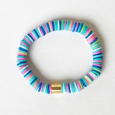 Turquoise Fiesta disc bracelets combine two classic summer colors - turquoise and pink! Bright and festive, these lightweight, stretchy Heishi bracelets are perfect for your summer wardrobe. Wear them on the boat, to the beach, or out to dinner - they're always ready to party! This stack is available in several options: Single Fiesta disc bracelet Set of 3 Looking for something else? 🌈These mix perfectly with our BRIGHT disc bracelets in solid colors ---> https://etsy.me/2QsgKnu 🎉 Confetti Multicolor Heishi Beads Bracelets For Summer, Summer Multicolor Heishi Beads Bracelets, Playful Beaded Turquoise Bracelets, Playful Turquoise Beaded Bracelet, Playful Blue Jewelry For Vacation, Beach Multicolor Heishi Beads Bracelets, Blue Heishi Beads Bracelets For Summer, Playful Turquoise Beaded Bracelets With Colorful Beads, Summer Blue Heishi Beads Bracelets