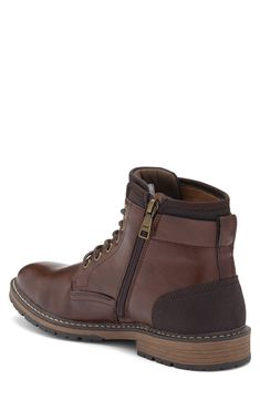 A Goodyear welt stitching adds a rugged craftsmanship to this lace-up combat boot with a side zip for easy access. Synthetic upper/textile lining/rubber sole Imported Casual Lace-up Combat Boots With Zipper, Rugged Insulated Lace-up Combat Boots, Winter Leather Lace-up Boots With Zipper, Winter Leather Combat Boots With Zipper, Winter Leather Combat Boots With Zipper Closure, Winter Lace-up Combat Boots With Zipper Closure, Brown Winter Combat Boots With Zipper Closure, Casual High Ankle Lace-up Boots With Zipper, Ankle-high Boots With Zipper Closure For Outdoor