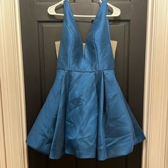 Sherri Hill Size 10 Blue Dress Deep V But With Cloth Across The Cross Cut Low In Sides But Also With Cloth. Lined Built In Padded Skirt Has Extra Layers For Fullness. Great Condition 15” Across At Waist 34” Shoulder To Hem Blue A-line Pleated Dress, Blue A-line Cocktail Dress, Blue A-line Midi Dress For Formal Occasions, Blue A-line Dress For Evening, Light Blue A-line Mini Dress For Evening, Light Blue A-line Pleated Dress, Light Blue Pleated A-line Dress, Blue A-line Formal Dress, Light Blue A-line Mini Dress For Party