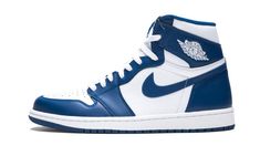 The Air Jordan 1 High OG “Storm Blue” is an original colorway of Michael Jordan’s first signature shoe that was re-released in 2016.  The “Storm Blue” is one of multiple designs of the retro basketball shoe to originally release back in 1985.  A popular look that draws similarities to the Nike Dunk’s “Kentucky” colorway, the “Storm Blue” was never worn by Jordan in the NBA, and didn’t receive a retro release until 2016.  The modern “Storm Blue” is nearly identical to the first version of the white-and-blue colorway, as it features white tumbled leather on the perforated toe, mid-panel, collar, and heel.  Contrasting Storm Blue leather appears on the overlays and Swoosh branding.  A white “Wings” logo is found on the collar and blue “Nike Air” and Swoosh detailing is printed on the white ny Original Air Jordans, Retro Basketball Shoes, Air Jordan 1 Retro High Og, Air Jordan 1 Retro High, Air Jordans Retro, Blue Nike, Air Jordan 1 Retro, Jordan 1 Retro High, Jordan 1 Retro