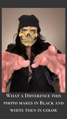 a person wearing a skeleton mask and holding their hands out in front of them, with the caption what a reference this photo makes in black and white then in color