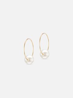 A delicate take on the essential pearl earring. These hoops feature one floating pearl with modern elegance. 14k yellow gold Pearl Made in New York Pearl Earring, Pearl Hoop Earrings, Donate To Charity, Gold Hoops, Gold Pearl, Modern Elegance, Ring Bracelet, Earring Necklace, Charm Necklace