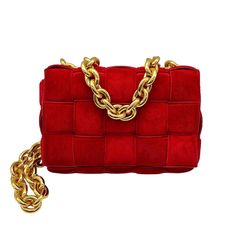 We are offering this coveted red Bottega Veneta crossbody bag. Made in Italy, it is finely crafted of a padded intrecciato suede exterior with leather trims. It has a heavy chain-link handle and shoulder strap made from gold-tone hardware. It features a push through closure that opens up to a spacious red suede interior with a single zipped pocket pouch. Estimated Retail: $5000. Bottega Veneta Crossbody Bag, Bottega Veneta Cassette, Bottega Veneta Bags, Heavy Chain, Bv Bag, Chain Crossbody Bag, The Chain, Handbag Wallet, Red Suede