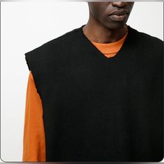 An Oversized Vest In A Heavy Rib Knit Featuring Raw Edge Detailing At The Neck, Armholes And Hem. - Made In Portugal - 100% Cotton - Oversized Fit - Machine Wash - Model Is 6'1, 145lbs And Wears Size Medium Check Out Our Closet For More Great Deals!! Guaranteed Authentic! Black Knit Sweater For Layering, Black Oversized Sweater For Layering, Oversized Black Sweater For Layering, Black Knitted Sweater For Layering, Black Knit Tops For Streetwear, Black Knit Streetwear Tops, Black Knitted Crew Neck Outerwear, Black Knit Sweater For Streetwear, Oversized Black Knit Outerwear